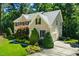 Beautiful home featuring a brick facade, attached garage and mature trees at 83 Calabria Ct, Clayton, NC 27527