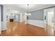 Hardwood floors, a fireplace, and open entryways define this inviting living space at 83 Calabria Ct, Clayton, NC 27527