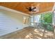 Charming screened porch perfect for entertaining and relaxation offering wood flooring, and views of the backyard at 83 Calabria Ct, Clayton, NC 27527