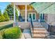 Outdoor patio with a grill and brick columns, steps leading up to the patio at 90 S Old Lantern Rd, Timberlake, NC 27583