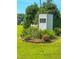 Holeman Plantation community entrance sign surrounded by garden and greenery at 90 S Old Lantern Rd, Timberlake, NC 27583