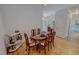 Cozy dining room featuring hardwood floors, wood table with six chairs, and a serving cart at 90 S Old Lantern Rd, Timberlake, NC 27583