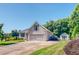 Well-maintained home with a two-car garage, lovely landscaping, and a storage shed in the backyard at 90 S Old Lantern Rd, Timberlake, NC 27583