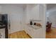 Kitchen with granite countertops, white cabinets, and access to the backyard at 90 S Old Lantern Rd, Timberlake, NC 27583