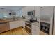 Kitchen with stainless steel appliances, granite countertops, and views to the living room at 90 S Old Lantern Rd, Timberlake, NC 27583