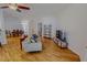 Inviting living room featuring hardwood floors, bright neutral paint, and comfortable seating at 90 S Old Lantern Rd, Timberlake, NC 27583