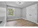 Bedroom with new floors, gray paint and new closet at 904 Lanier Farm Rd, Sanford, NC 27330