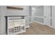 A dining room feature wall with a gray counter, white shelves and drawers and wood accents at 904 Lanier Farm Rd, Sanford, NC 27330
