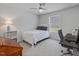 Inviting bedroom featuring a bed, desk, and neutral decor, creating a peaceful retreat at 100 Haddonfield Ct, Franklinton, NC 27525