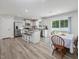 Stylish kitchen featuring a center island with seating and stainless appliances at 100 Haddonfield Ct, Franklinton, NC 27525