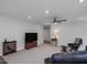 Cozy living room featuring recessed lighting and plush carpeting at 100 Haddonfield Ct, Franklinton, NC 27525