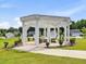 Community pergola features seating with views of the surrounding homes and landscaped grounds at 100 Haddonfield Ct, Franklinton, NC 27525