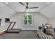 Bonus room featuring a ceiling fan, carpet, and office and exercise equipment at 101 Ferndale Ct, Clayton, NC 27520