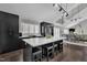 Stylish kitchen featuring a large island, modern appliances, and a seamless open floor plan at 101 Ferndale Ct, Clayton, NC 27520