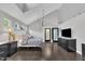 Elegant main bedroom with vaulted ceilings, hardwood floors, and a serene atmosphere with great natural lighting at 101 Ferndale Ct, Clayton, NC 27520
