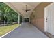 Covered patio featuring ceiling fans and a smooth floor is perfect for outdoor living at 101 Ferndale Ct, Clayton, NC 27520