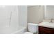 Bright bathroom features a shower-tub combo, toilet, and vanity with sink at 103 Bermuda Green Dr, Durham, NC 27703