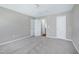 This spacious bedroom features neutral walls, plush carpeting, and ample closet space at 103 Bermuda Green Dr, Durham, NC 27703