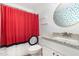 Charming bathroom with granite counters, quirky decor, and a uniquely patterned shower curtain at 11 Sherman Rd, Fuquay Varina, NC 27526