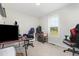 Bedroom featuring carpeted floors, natural light, and an ideal space for studying or working at 11 Sherman Rd, Fuquay Varina, NC 27526
