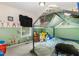 Playful bedroom with whimsical wall decor and an imaginative canopy bed for a delight at 11 Sherman Rd, Fuquay Varina, NC 27526