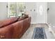 Cozy living room with a decorative door and large window at 11 Sherman Rd, Fuquay Varina, NC 27526