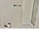 A bathroom featuring a black towel bar and toilet paper holder at 1121 Brookhill Way, Cary, NC 27519