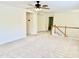 Neutral bonus room with view of stairs and hallway at 1121 Brookhill Way, Cary, NC 27519