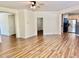 An empty living room with laminate flooring at 1121 Brookhill Way, Cary, NC 27519