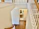 Stairway view leading to a bathroom with modern fixtures at 1121 Brookhill Way, Cary, NC 27519