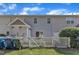 The backyard features a white picket fence and well-maintained lawn, creating a private retreat at 11309 Shadow Elms Lane Ln, Raleigh, NC 27614