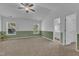 Spacious main bedroom featuring large windows and en suite bathroom at 11309 Shadow Elms Lane Ln, Raleigh, NC 27614