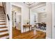 Elegant entryway with hardwood floors, showcasing the home's open layout leading to the dining room at 1168 Great Ridge Pkwy, Chapel Hill, NC 27516