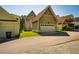 A collection of garages in a neighborhood setting with a paved driveway at 1168 Great Ridge Pkwy, Chapel Hill, NC 27516