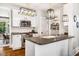 Modern kitchen with stainless steel appliances and center island sink at 1168 Great Ridge Pkwy, Chapel Hill, NC 27516