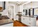 Bright kitchen with stainless steel appliances, granite countertops, and hardwood floors at 1168 Great Ridge Pkwy, Chapel Hill, NC 27516