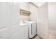 Bright laundry room with white washer and dryer at 1168 Great Ridge Pkwy, Chapel Hill, NC 27516
