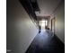 Hallway with visible entryway showing field view in the distance at 12670 School House Rd, Middlesex, NC 27557