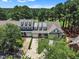 Aerial view of townhomes with well-manicured lawns and access to the lush golf course at 1326 Fairview Club Dr, Wake Forest, NC 27587