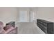 Bedroom featuring neutral walls, carpet, furniture, and closet at 1326 Fairview Club Dr, Wake Forest, NC 27587