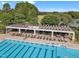 Inviting community pool with abundant lounge chairs at 1326 Fairview Club Dr, Wake Forest, NC 27587