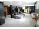 Finished basement offers a cozy retreat with plush seating and a bar area for entertaining at 1603 N Alston Ave, Durham, NC 27701