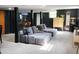 Basement with lounge area, bar, dining table, cabinetry, and carpet at 1603 N Alston Ave, Durham, NC 27701