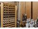 Large wine collection with wooden shelves and organized by row in temperature controlled storage space at 1603 N Alston Ave, Durham, NC 27701