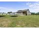 Lovely back exterior of the home with a spacious backyard and inviting porch at 172 Fox Run Ct, Benson, NC 27504