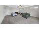 Cozy bedroom featuring two twin beds, a comfortable couch, and bright natural light at 172 Fox Run Ct, Benson, NC 27504