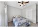 Bedroom features a ceiling fan, neutral walls and carpet flooring at 172 Fox Run Ct, Benson, NC 27504