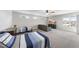 Relaxing bedroom featuring two beds, a comfortable sofa, and a modern television at 172 Fox Run Ct, Benson, NC 27504