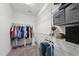 Walk-in closet with metal shelving and ample storage for clothes and accessories at 172 Fox Run Ct, Benson, NC 27504
