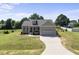 Charming single Gathering home with well maintained lawn and an attached two car garage at 172 Fox Run Ct, Benson, NC 27504